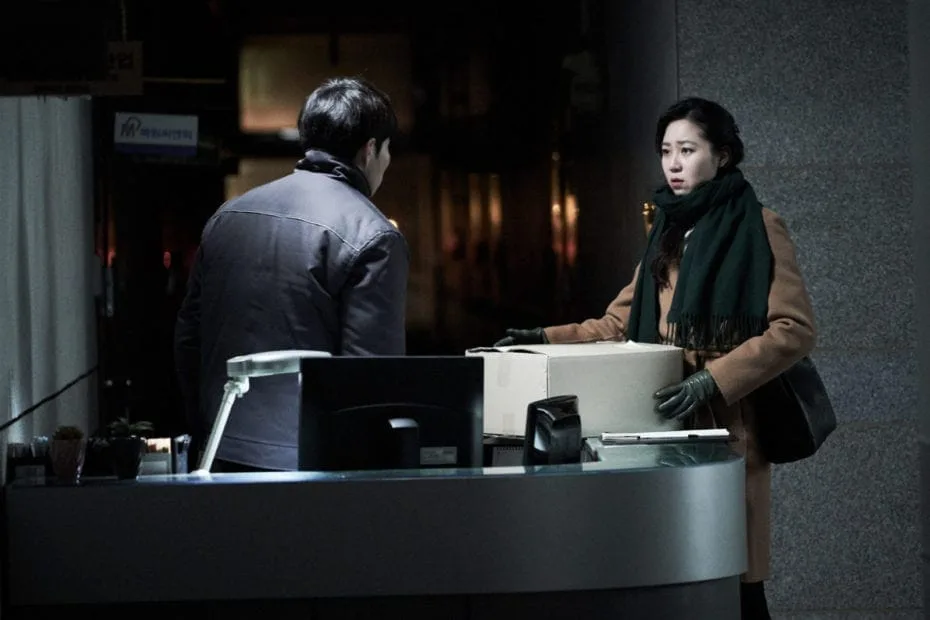 Movies out now. Hyo-Jin Kong as Jo with her manager in Door Lock. A reboot of the movie Sleep Tight. 