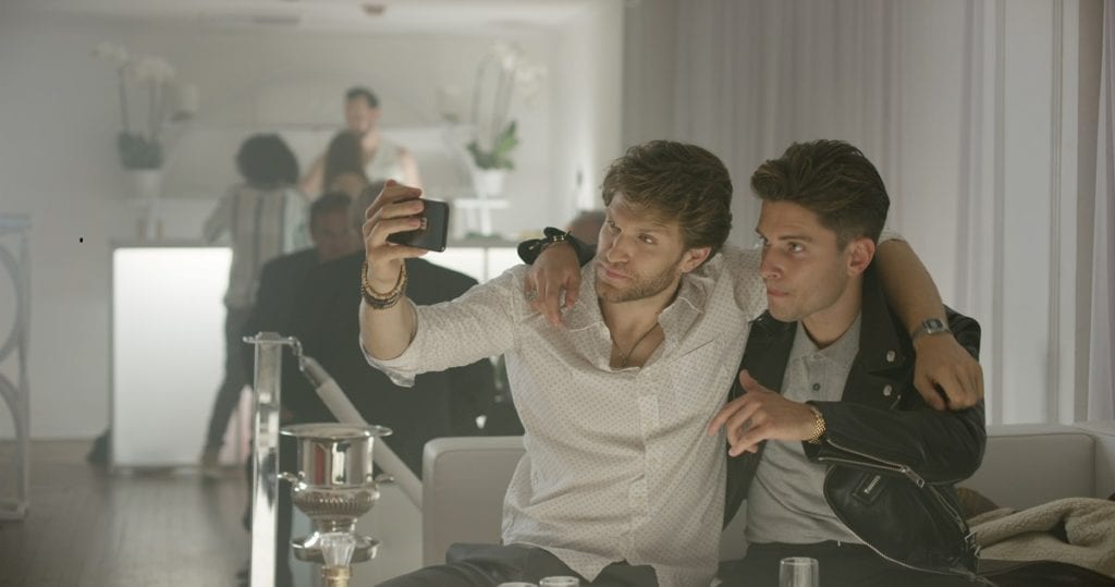 Social media influencer Cole snaps a pic with Keegan in No Escape 2020