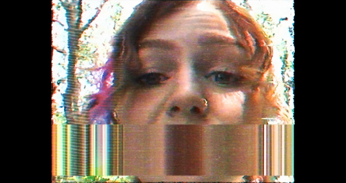 Kris Collins exploring haunted mansion in found footage influencer horror