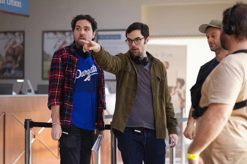 Berk and Olsen in the making of Novocaine, bank scene