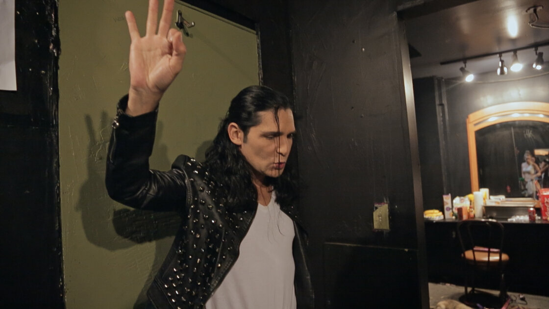 Corey Feldman backstage in Corey Feldman VS the World documentary exploring child star trauma and reinvention