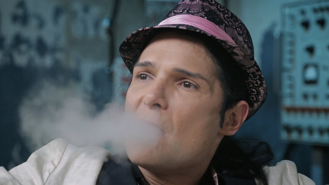 Corey Feldman smoking in candid moment from documentary Corey Feldman VS the World