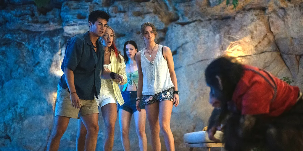 Lucy, Hannah, Kate and Nick stand together in a scene from Primate (2026)